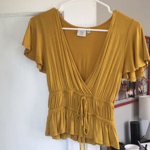 Yellow v neck shirt